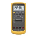 Fluke 87V True-RMS Industrial Multimeter with test leads and alligator clips on a white background.