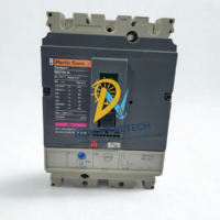 Front face of a Merlin Gerin Compact NS100H TM40D circuit breaker showcasing the rating label, trip unit dial settings, and toggle switch.