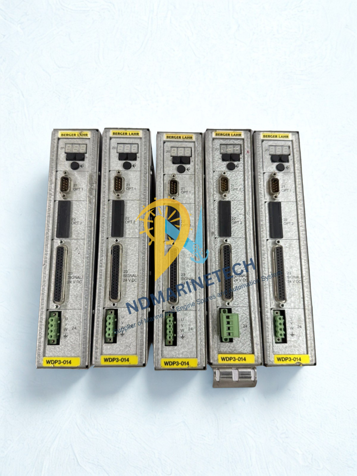 BERGER LAHR WDP3-014.0801 Front control panels of BERGER LAHR WDP3-014 drives showing 7-segment status displays, OPT.1 communication ports, and 24V DC signal connectors