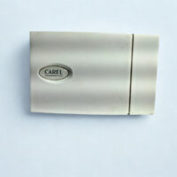 Front view of the Carel DPWC111000 wall-mounted temperature and humidity sensor with a grey plastic vented enclosure and Carel logo