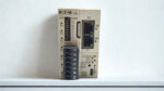 Front view of Eaton Power Xpert C445 intelligent motor management relay showing DIP switches, RJ45 Modbus ports, and USB diagnostic port