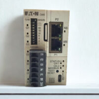 Front view of Eaton Power Xpert C445 intelligent motor management relay showing DIP switches, RJ45 Modbus ports, and USB diagnostic port