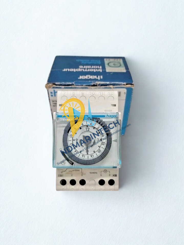 Hager EH110 Daily Time Switch New Hager EH110 daily time switch sitting in front of its original blue Hager packaging.