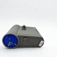 Side perspective view of the gray Honeywell CC-PAIX02 Series C module showcasing the ventilated housing design and the mounting screw for Experion C300 installation