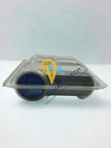 Side profile of a Honeywell CC-PDIL01 Digital Input module in original protective clear blister packaging showing the Honeywell branding