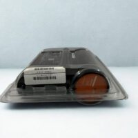 Close-up side view of Honeywell FC-PUIO01 module featuring the orange "Safety UIO" circular cap and serial number barcode label