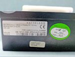 Close-up of the Hatteland Display AS label for the HD13T21 KMC-EP9CACP maritime multi-computer, showing 24V 35W power rating and Windows Embedded OS sticker