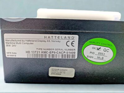 Hatteland-Display-HD13T21-KMC-EP9CACP-Specs Close-up of the Hatteland Display AS label for the HD13T21 KMC-EP9CACP maritime multi-computer, showing 24V 35W power rating and Windows Embedded OS sticker