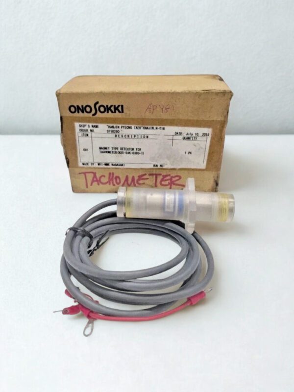 ono-sokki-ap-981-tachometer-sensor-marine-application Ono Sokki AP-981 magnet type detector for tachometer use, shown with a marine shipping label and its integrated durable connection cable