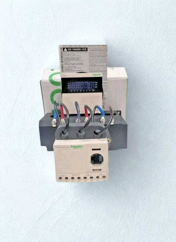 Schneider-EOCR-FDM2-WRDUW-Full-Assembly A complete Schneider EOCR FDM2-WRDUW unit including the digital display module, processing unit, and 3CT-H1-100-C current transformer module with connected wiring.