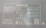 Detailed close-up of Siemens 6ES7414-5HM06-0AB0 label showing serial number, Made in Germany, and safety certifications