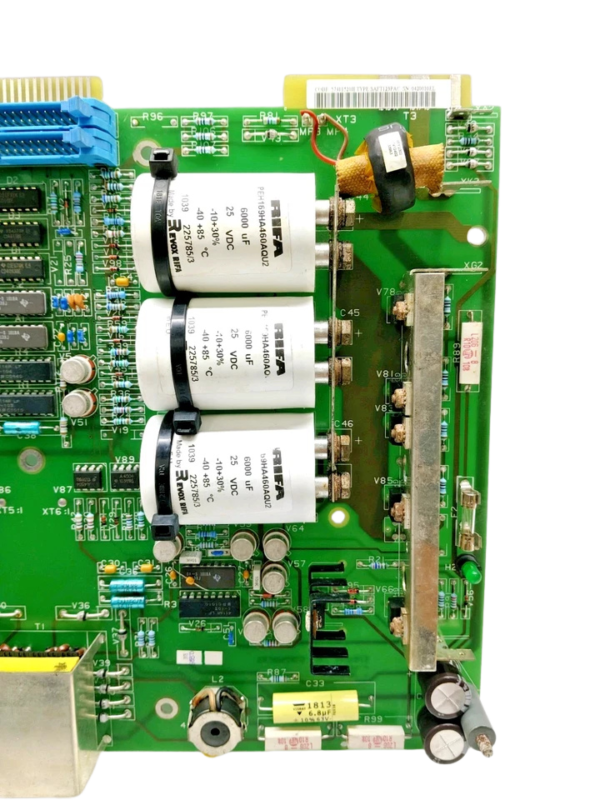 RIFA Capacitors on ABB SAFT 123 PAC Board Close-up of three white RIFA 6000uF capacitors mounted on the right side of an ABB SAFT 123 PAC circuit board with visible heat sinks and resistors
