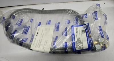 Daihatsu Braided Hose (Y190303900ZA) A braided steel flexible hose with metallic fittings, sealed inside a Daihatsu genuine parts plastic bag with a label showing part number Y190303900ZA.