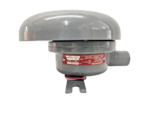 A side profile of the Edwards Signaling 340EX-8N5 showing the gray epoxy-coated cast aluminum housing and the red identification nameplate