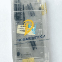 Technical close-up of Honeywell CC-TAOX11 showing compatibility with CC-PAOH01 and CC-PAOX01 modules and revision markings.