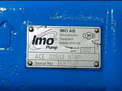 IMO ACE 025N3 NTBP Model and Serial Number Plate Close-up of the metal nameplate for an IMO AB pump, model ACE 025N3 NTBP, manufactured in 2012, serial number 697546