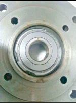 Top down view of IMO ACE 038N2 NTBP Front Cover with high-precision ball bearing installed.