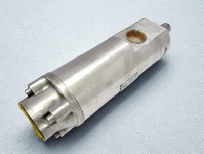 IMO E4 045N1 LEJE Triple-Screw Pump Exterior Body. Side view of a new IMO E4 045N1 LEJE medium pressure triple-screw pump showing the inlet port and stainless steel housing.