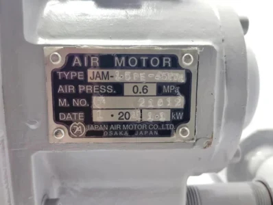JAM-1.5PE-450DR Technical Specification Plate - Osaka Japan Close-up of the official JAM Air Motor nameplate for model 1.5PE-450DR showing 0.6 MPa operating pressure and 1.1 kW power rating.