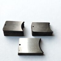 Stacked Pell POC2500-4 replacement cutter blades for heavy duty marine cable cutting tools showing precision beveled edges