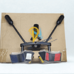 SOLO 200-001 Universal Smoke Detector Removal Tool with adjustable color-coded tri-grips and swivel joint.