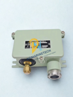 Top view of Saginomiya SNS-C130W drip-proof pressure control with metal nameplate
