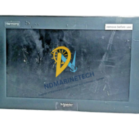 Front view of Schneider Electric HMIDM7521 15-inch wide multi-touch industrial display with protective film and Harmony branding