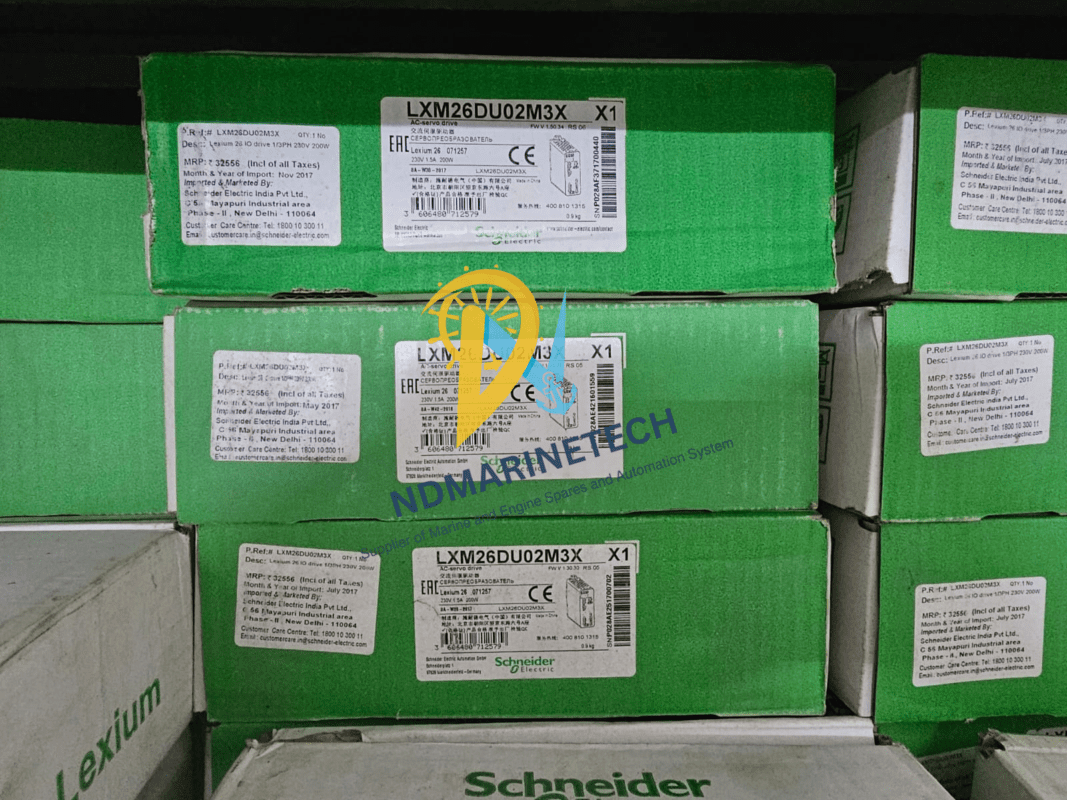 Schneider Electric LXM26DU02M3X Inventory - New in Box Bulk stock of Schneider Electric LXM26DU02M3X Lexium 26 servo drives in original green packaging with visible labels.