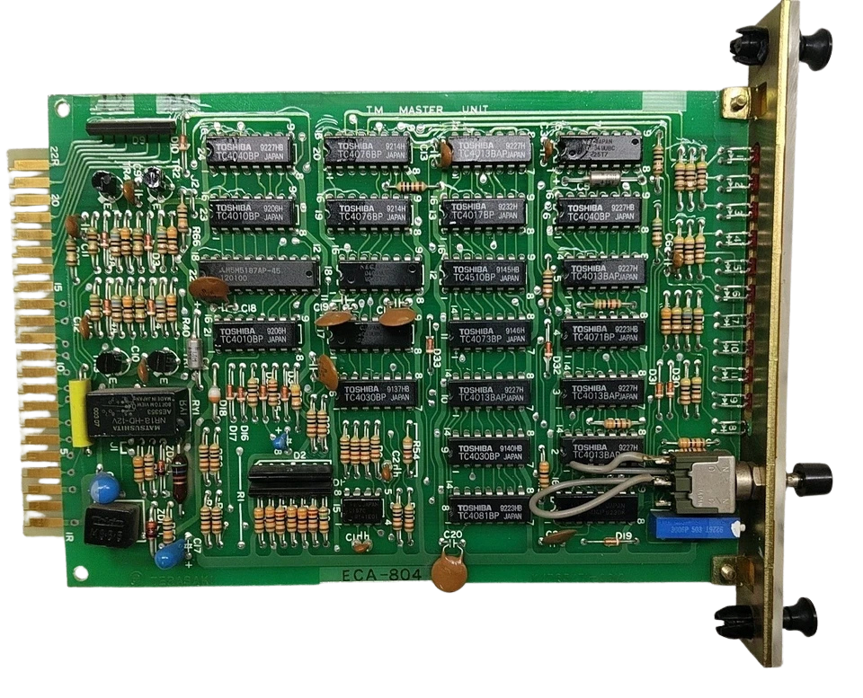 Terasaki ECA-804 Marine PCB Component Layout Front view of Terasaki ECA-804 Electronic Circuit Board showing Toshiba TC4000 series ICs and capacitors.