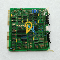 Full view of Terasaki EMW-1301 Electronic PCB Board for industrial control systems with gold-plated edge connectors and mounting clips.