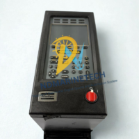 Front control panel of Atlas Copco Power Focus PF4000-G-PN-HW with digital display, keypad interface, and emergency stop switch.