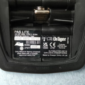 Dräger PAS Lite SCBA technical label and serial information. Dräger PAS Lite SCBA technical label detailing EN 137:2006 Type 2 compliance, serial prefix BRSC, MED/UK Marine compliance for 2023, and explosive atmosphere safety.