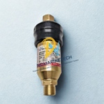 Close-up of Drew Marine PCN 548026 Oxygen Backfire Valve showing brass body, technical specifications label, and ISO 5175 compliance markings.