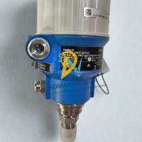 Close-up view of Endress-Hauser Cerabar M PMP51-Q9F7-1K9 pressure transmitter showing the nameplate, electrical terminal housing, and metallic process connection thread.