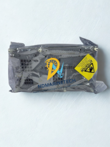 Honeywell CC-TAID01 Analog Input IOTA board inside a sealed anti-static protective bag with a yellow ESD warning label, showing the rear circuit traces and components.