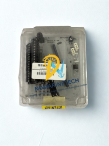 Honeywell CC TAIN01 Analog Input IO Module protected inside its original clear plastic casing with part number and serial number barcode labels visible.