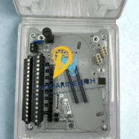 Genuine Honeywell CC-TAOX01 Analog Output Module IOTA resting safely inside its clear anti-static protective plastic e-commerce packaging shell.