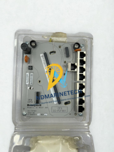 New surplus Honeywell CC-TCF901 control firewall input output termination assembly inside original clear plastic clamshell packaging.