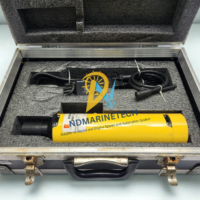 Kongsberg Simrad MST 319N mini SSBL transponder kit with LAD 219045 MST charger inside aluminum marine transit flight case with custom foam insert.