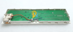 Miele 150304 printed circuit board back view showing the green PCB traces, RAFI switch module, and wiring harness assembly for marine laundry automation systems.