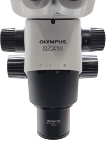 Olympus SZX10 Zoom Body and 1x Objective Lens Detailed view of Olympus SZX10 zoom body with adjustment knobs and DF PLAPO 1X-4 objective lens made in Japan.