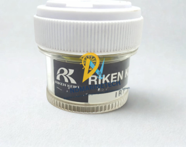 RIKEN KEIKI IRF-4345 NDIR Sensor Side Profile Side view of the cylindrical RIKEN KEIKI IRF-C4H10 infrared gas sensor unit with official brand labeling and a white protective cap.