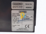 Close-up of SAACKE F-OSA Burner Control Unit 143200 nameplate showing technical specifications, serial number 4028535, 230V rating, and 50s purge time.