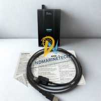 Siemens 6GK1571-1AA00 CP 5711 communication processor kit including industrial USB cable and printed manual.