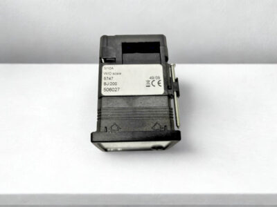 Tamrotor TMC NT5254 A-Meter Rear Specification Label Rear view of Tamrotor TMC NT5254 compressor ammeter gauge showing part number 5747 BJ200 and 506027 specifications label.