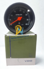 VDO 0-40 RPMx100 marine engine tachometer gauge resting on top of its original retail manufacturing box.