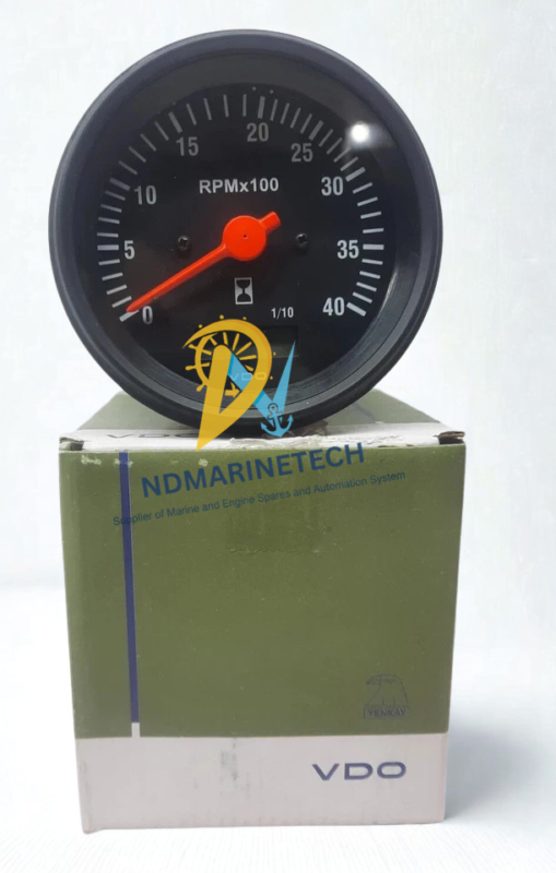 VDO 4000 RPM Gauge with Factory Box VDO 0-40 RPMx100 marine engine tachometer gauge resting on top of its original retail manufacturing box.