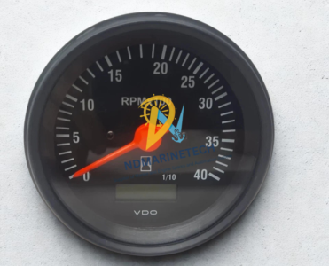 VDO 0-4000 RPM Marine Tachometer Front Dial Front dial closeup of a VDO 0 to 40 RPMx100 marine tachometer gauge featuring an integrated digital hour meter window.