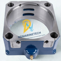 Heavy-duty blue WICHMANN AX water jacket showing the precision-machined internal bore, O-ring sealing grooves, and mounting bolt holes for marine diesel engines.
