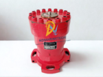 Manufacturer nameplate for Damcos BRC 052-A1 hydraulic actuator displaying model type, serial number, and 315 bar test pressure specifications.